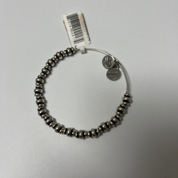 Alex and ANI Shiny Silver-tone NILE Metal BEADED Bangle Bracelet.
Bracelets - Picture 9 of 9